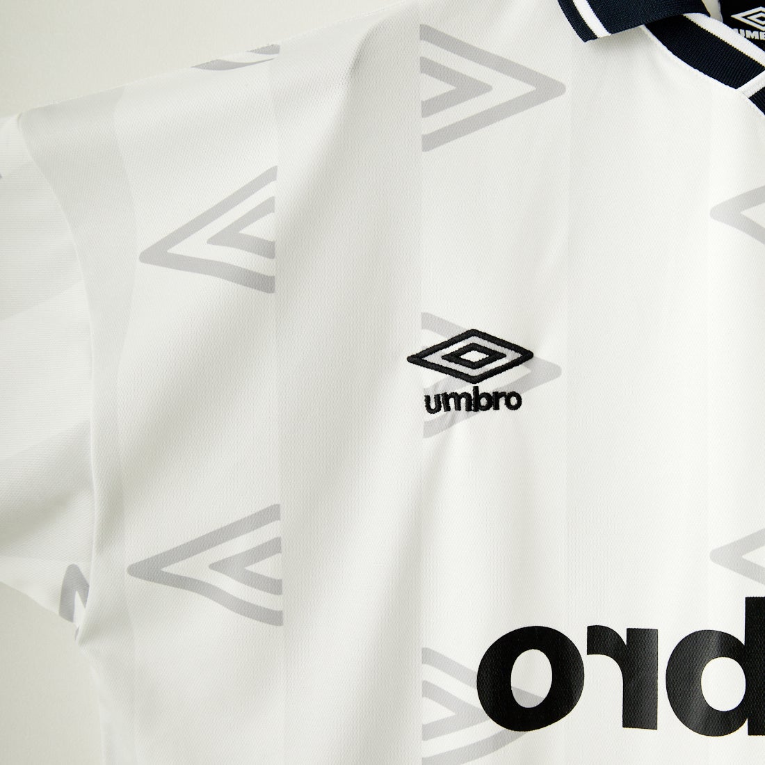 umbro [アンブロ] 別注 総柄プリント ゲームシャツ [UMNK-G0033-JF] WHITE