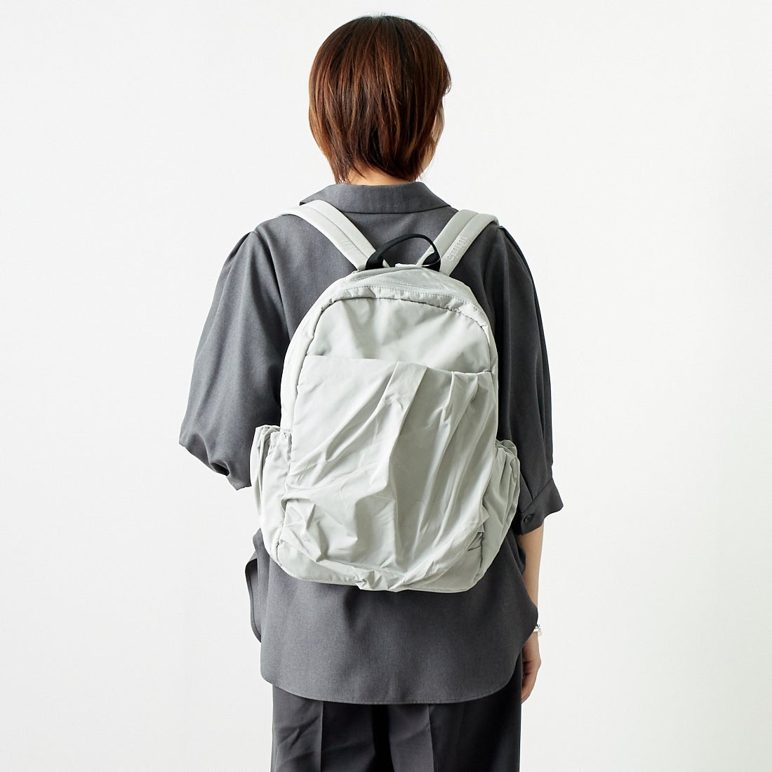 emmi [エミ] エコ撥水ギャザーボディーバックパック [13WGB239304] L.GRY