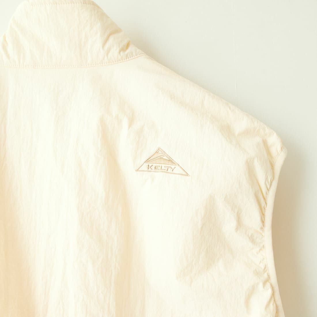 KELTY [ケルティ] 別注 中綿入り サイドスリットナイロンベスト [KE243W10IN02-JF] IVORY