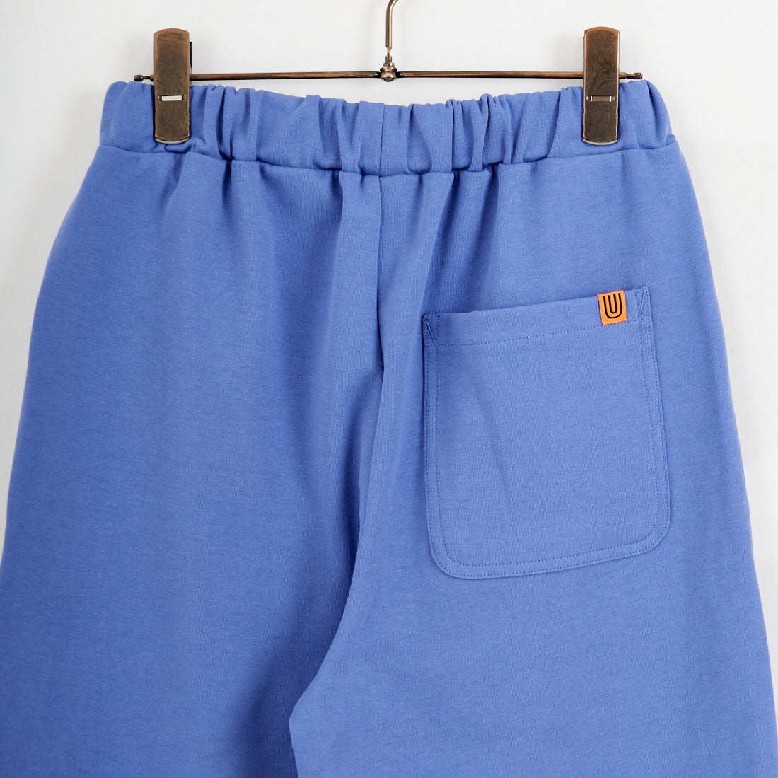 UNIVERSAL OVERALL [ユニバーサルオーバーオール] 別注 ポンチスウェットイージーパンツ [U2422601IN-JF] BLUE