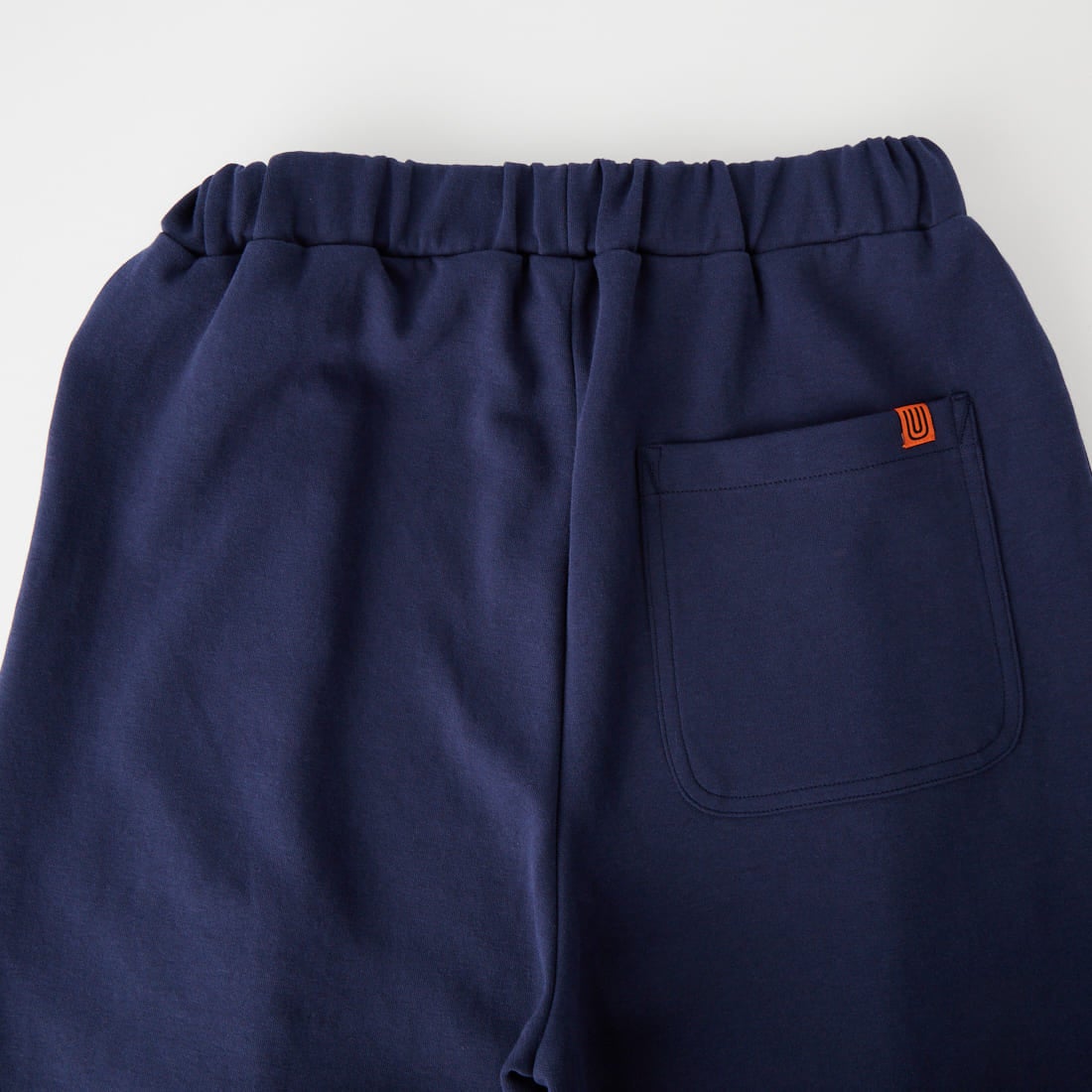 UNIVERSAL OVERALL [ユニバーサルオーバーオール] 別注 ポンチスウェットイージーパンツ [U2422601IN-JF] NAVY