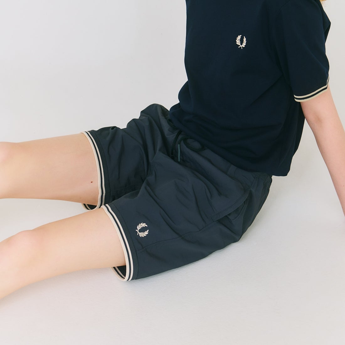 FRED PERRY [フレッドペリー] 別注 ワンポイントロゴ刺繍ショートパンツ [FPM-25S-001-JF] NVY/OAT
