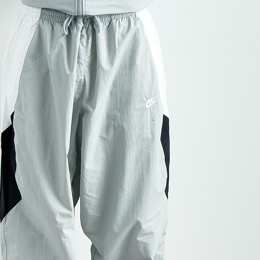 NIKE [ナイキ] クラブ ウーブントラックパンツ [HQ6115] 077 LT SMO