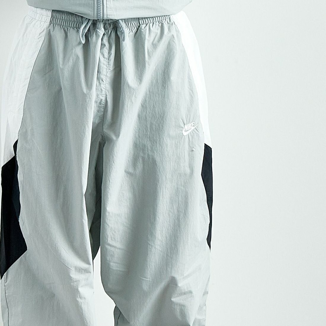 NIKE [ナイキ] クラブ ウーブントラックパンツ [HQ6115] 077 LT SMO