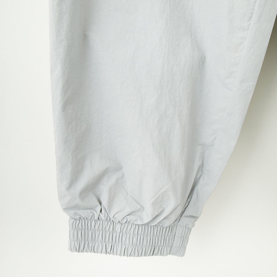 NIKE [ナイキ] クラブ ウーブントラックパンツ [HQ6115] 077 LT SMO