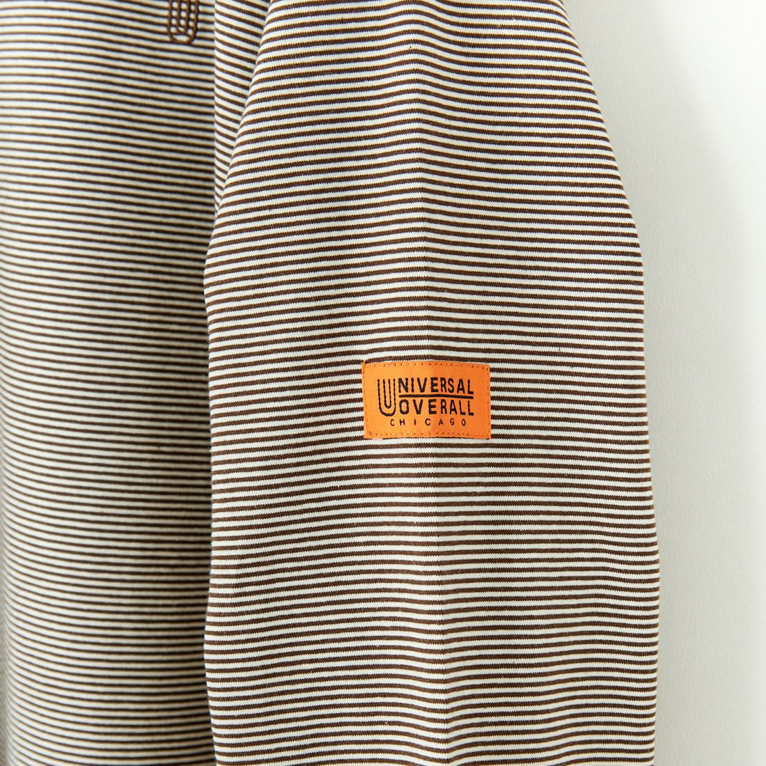 UNIVERSAL OVERALL [ユニバーサルオーバーオール] 別注 ワンポイントロゴ刺繍 ロングスリーブTシャツ [U2513215IN-JF] BROWN BDR