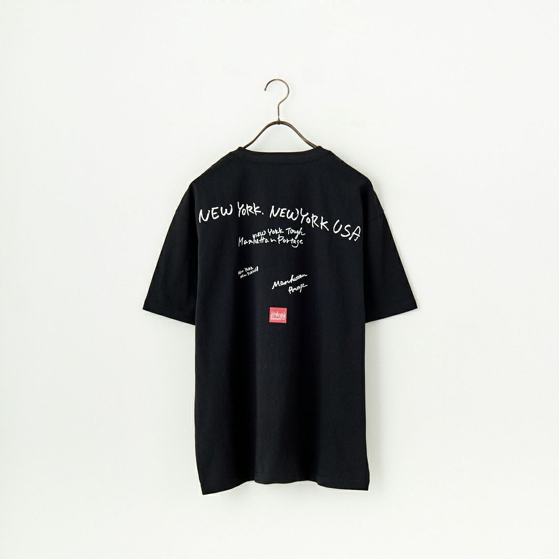 MANHATTAN PORTAGE [マンハッタンポーテージ] 別注 ランダムロゴ バックプリントTシャツ [25SSMP-IN66-JF] BLACK