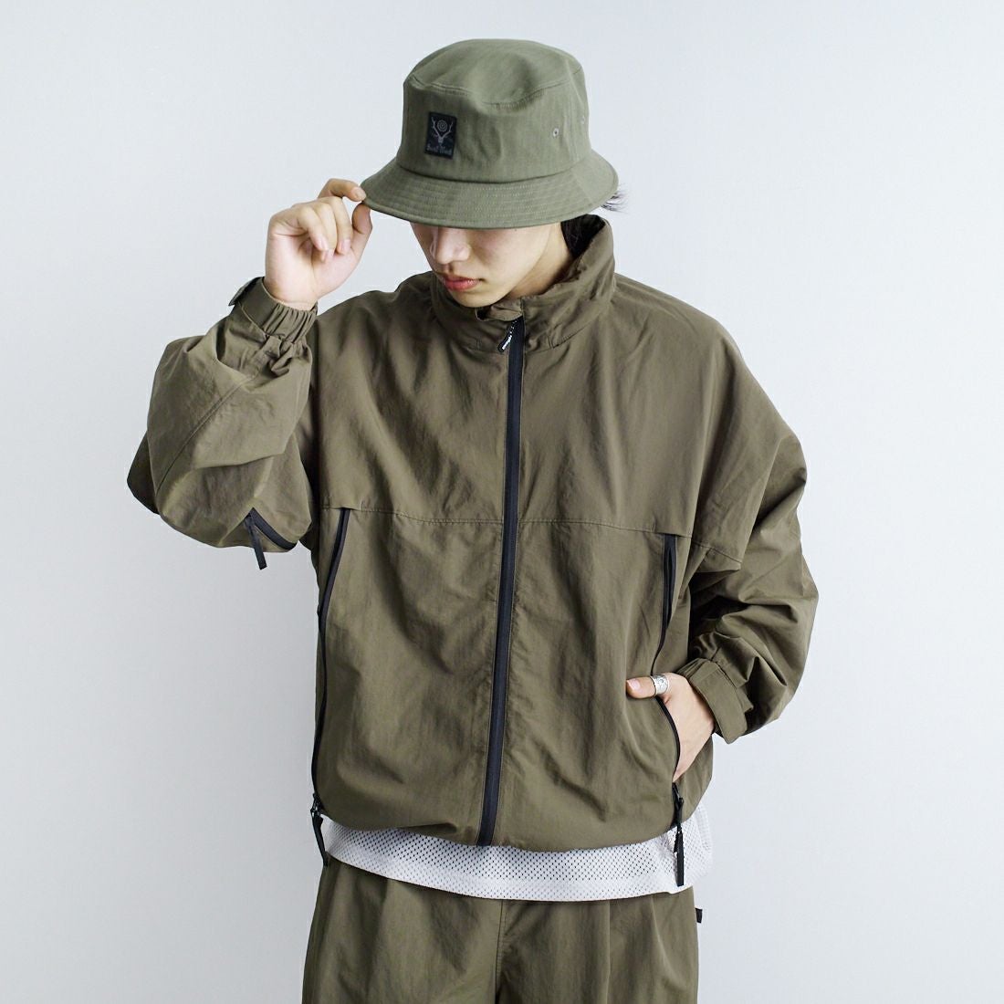 phenix [プラスフェニックス] 別注 LEVEL7 ライトナイロンジャケット