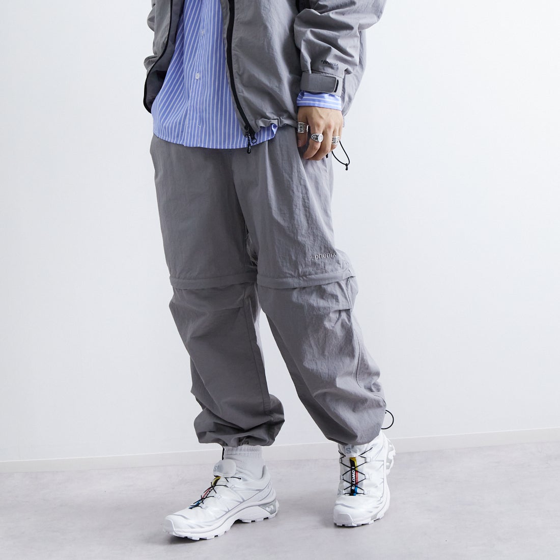 +phenix [プラスフェニックス] 別注 2WAY ナイロンタッサーコンバーチブルパンツ [POB-25007IN-JF] GRAY &&モデル身長：179cm 着用サイズ：L&&