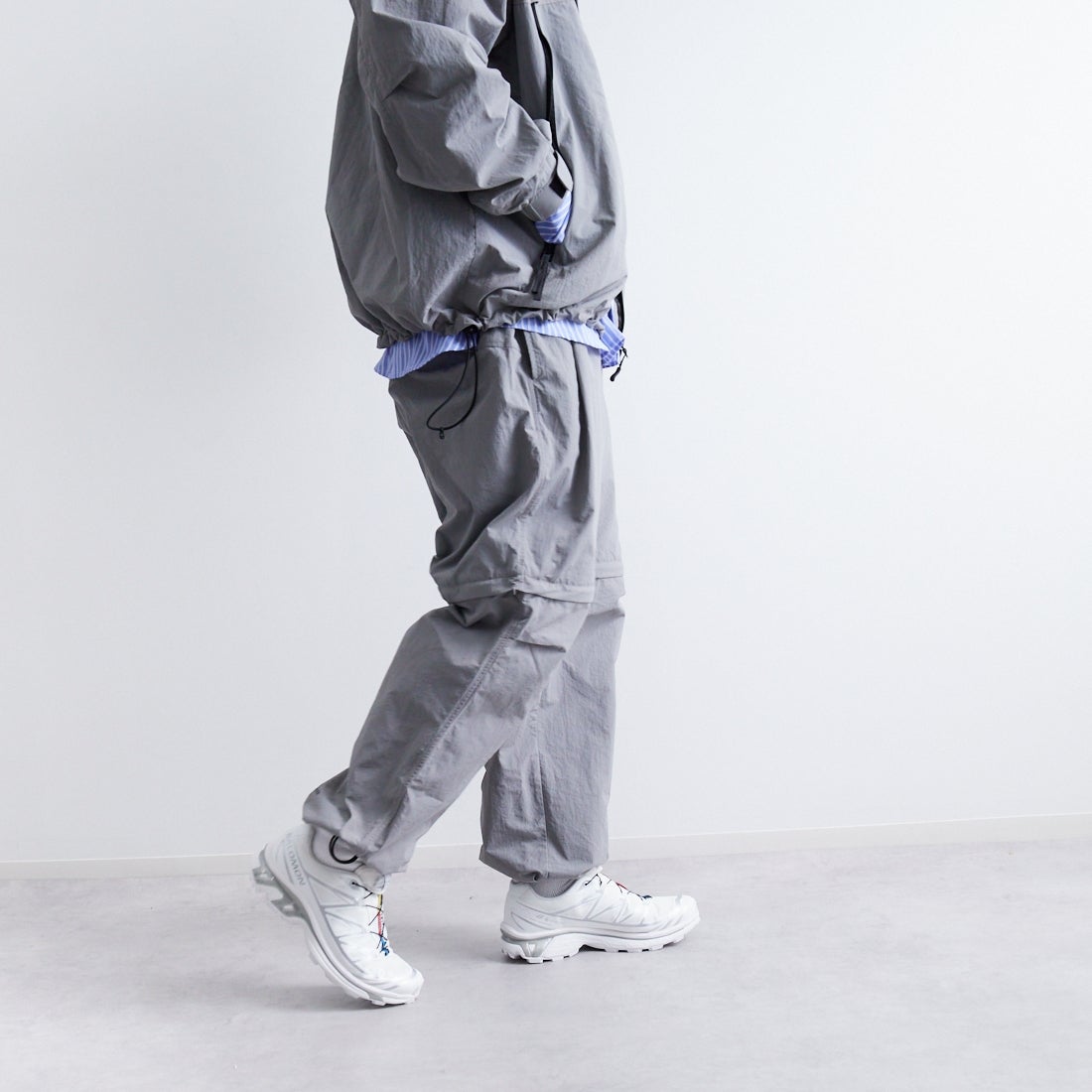 +phenix [プラスフェニックス] 別注 2WAY ナイロンタッサーコンバーチブルパンツ [POB-25007IN-JF] GRAY &&モデル身長：179cm 着用サイズ：L&&