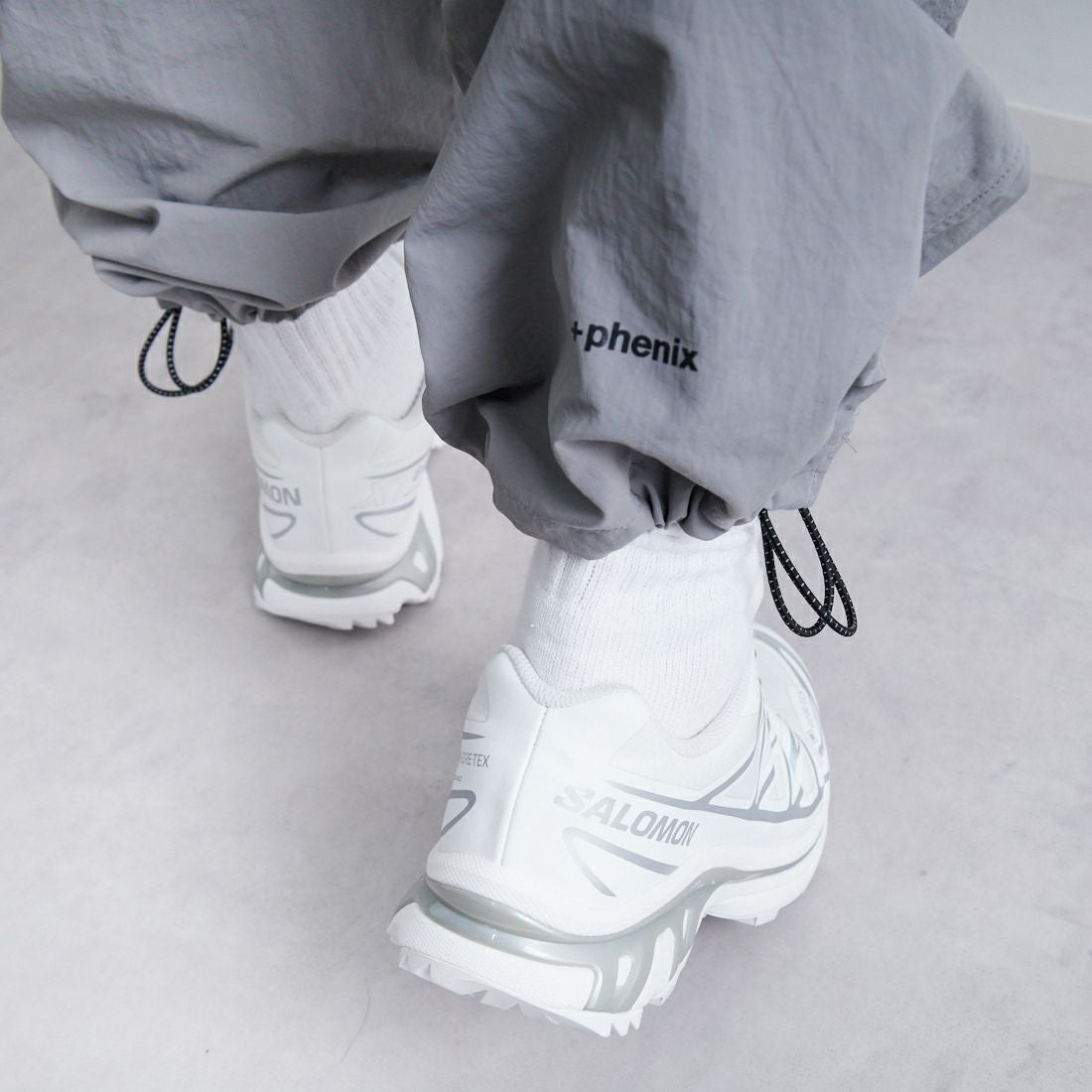 +phenix [プラスフェニックス] 別注 2WAY ナイロンタッサーコンバーチブルパンツ [POB-25007IN-JF] GRAY &&モデル身長：179cm 着用サイズ：L&&