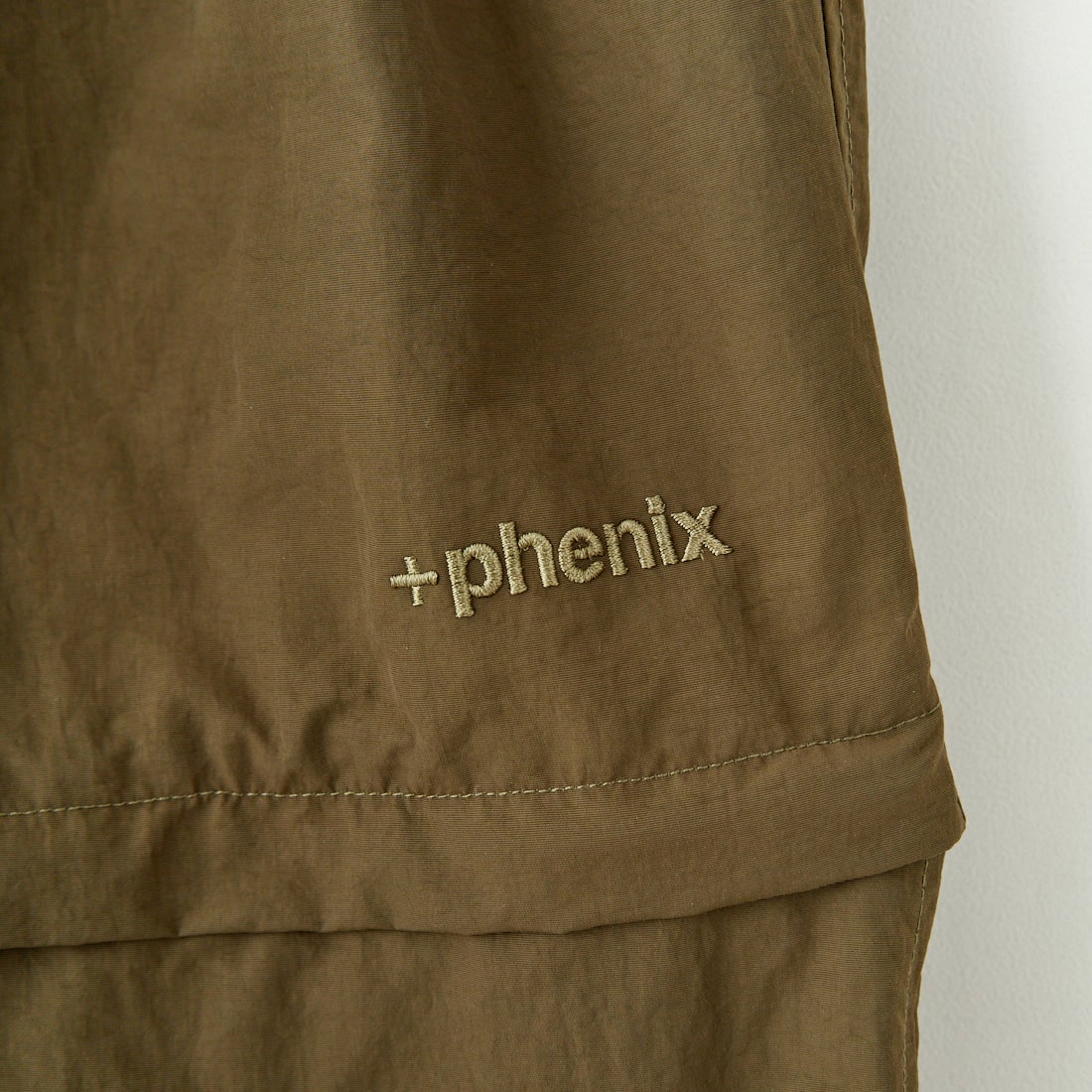 +phenix [プラスフェニックス] 別注 2WAY ナイロンタッサーコンバーチブルパンツ [POB-25007IN-JF] OLIVE