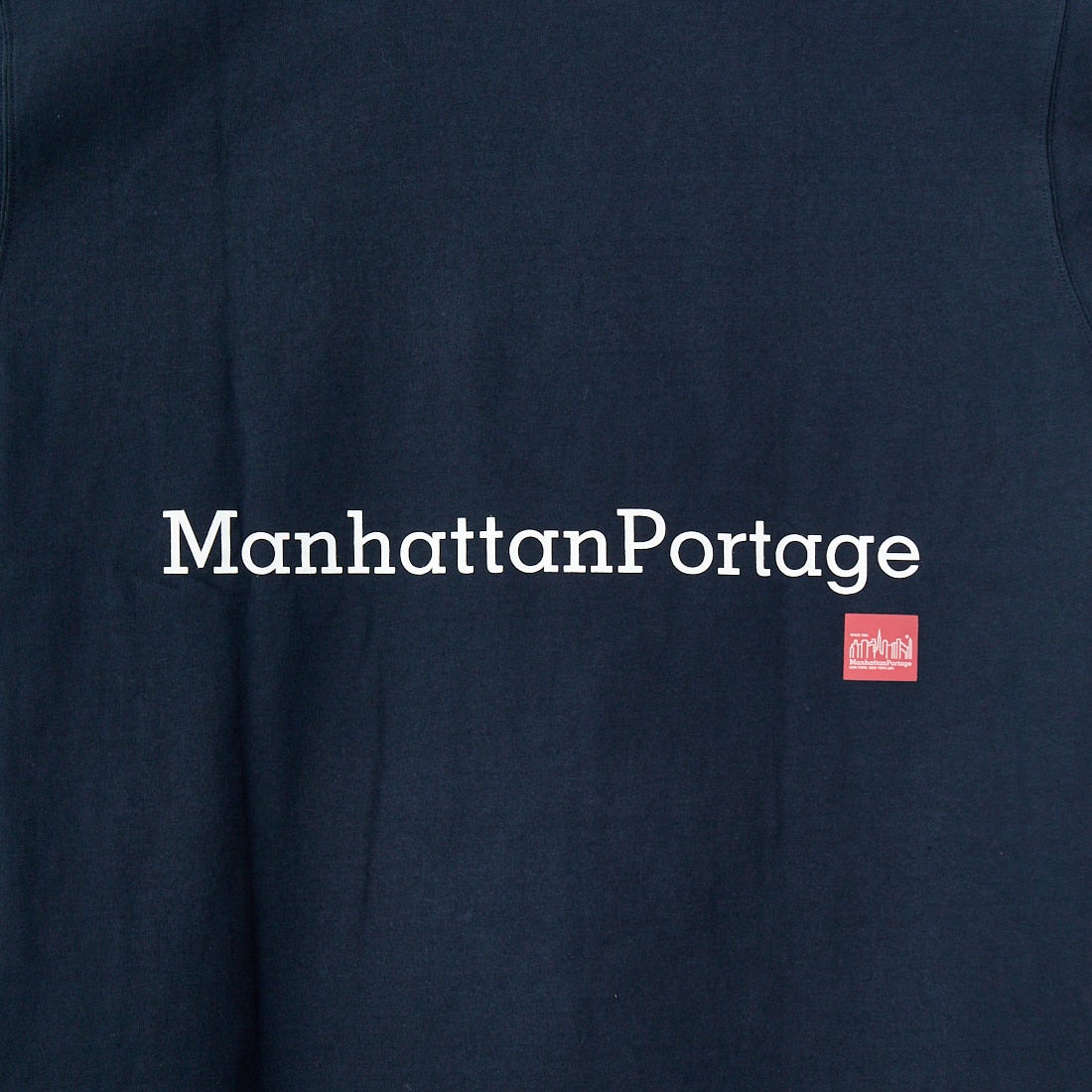 MANHATTAN PORTAGE [マンハッタンポーテージ] 別注 ポケット刺繍 バックプリントTシャツ [25SSMP-IN62-JF] NAVY