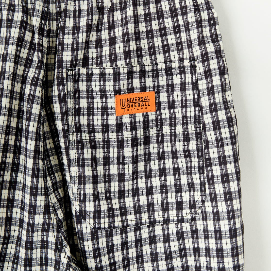 UNIVERSAL OVERALL [ユニバーサルオーバーオール] 別注 総柄イージーワイドパンツ [U2512634IN-JF] BLKﾁｪｯｸ