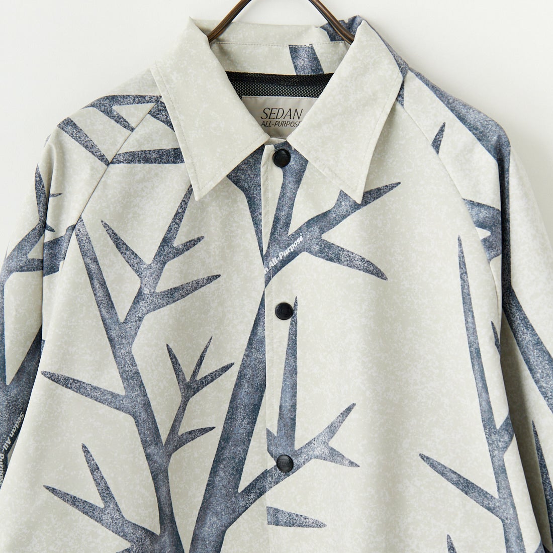 SEDAN ALL-PURPOSE [セダン オールパーパス] カモフラージュ コーチジャケット [SD25S-JK03] SNOW CAMO