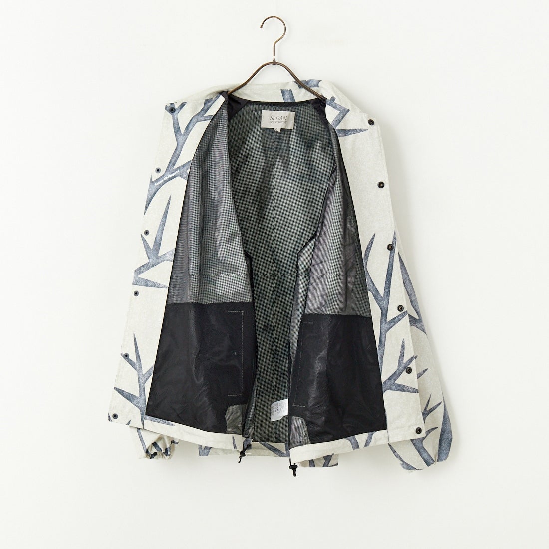 SEDAN ALL-PURPOSE [セダン オールパーパス] カモフラージュ コーチジャケット [SD25S-JK03] SNOW CAMO