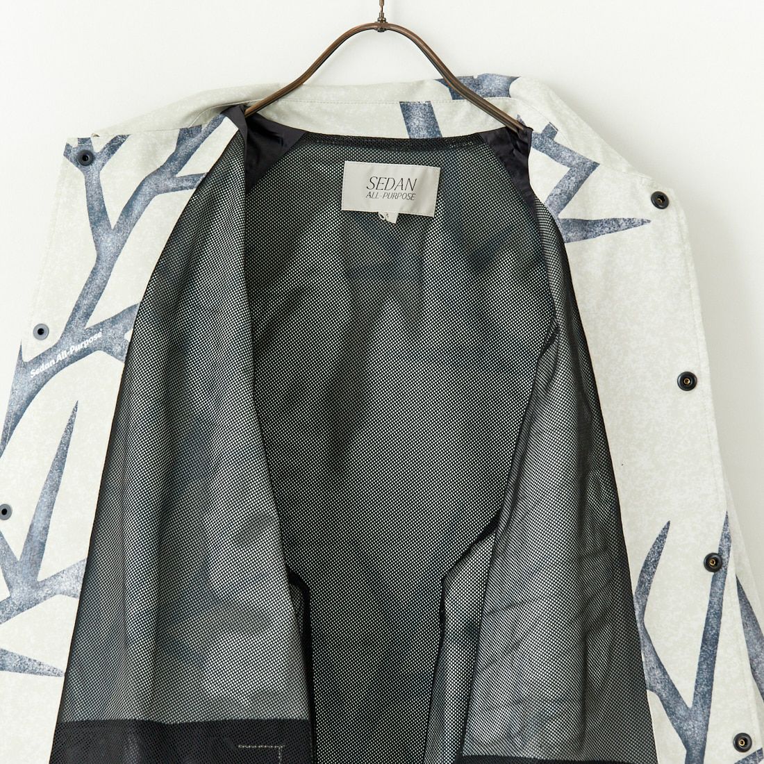 SEDAN ALL-PURPOSE [セダン オールパーパス] カモフラージュ コーチジャケット [SD25S-JK03] SNOW CAMO