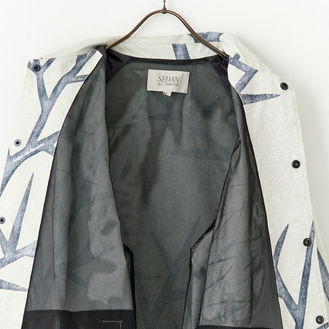 SEDAN ALL-PURPOSE [セダン オールパーパス] カモフラージュ コーチジャケット [SD25S-JK03] SNOW CAMO