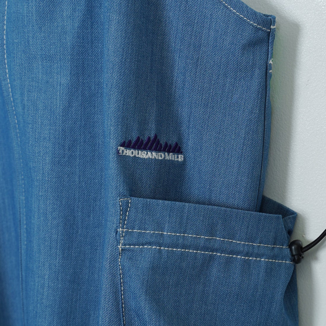 THOUSAND MILE [サウザンド マイル] フロントジップ サロペットワンピース [TM251TD00342] LT.BLUE