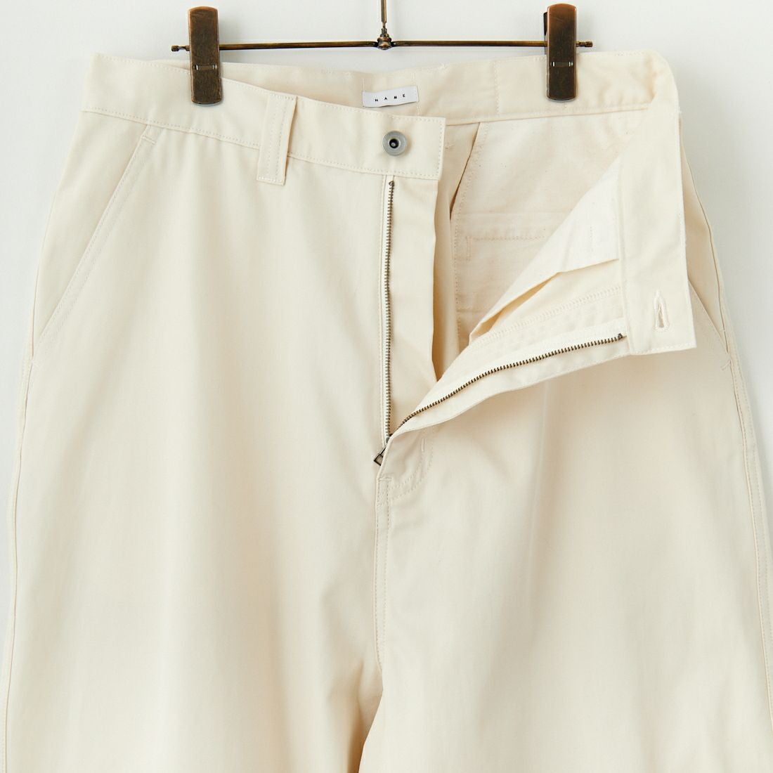 Name. [ネーム] ギザコットンギャバジン ベンチレーションレイヤードパンツ [NMPT-030] IVORY