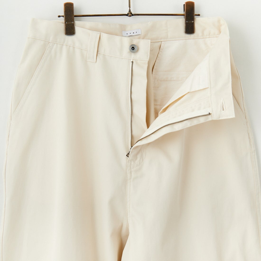 Name. [ネーム] ギザコットンギャバジン ベンチレーションレイヤードパンツ [NMPT-030] IVORY
