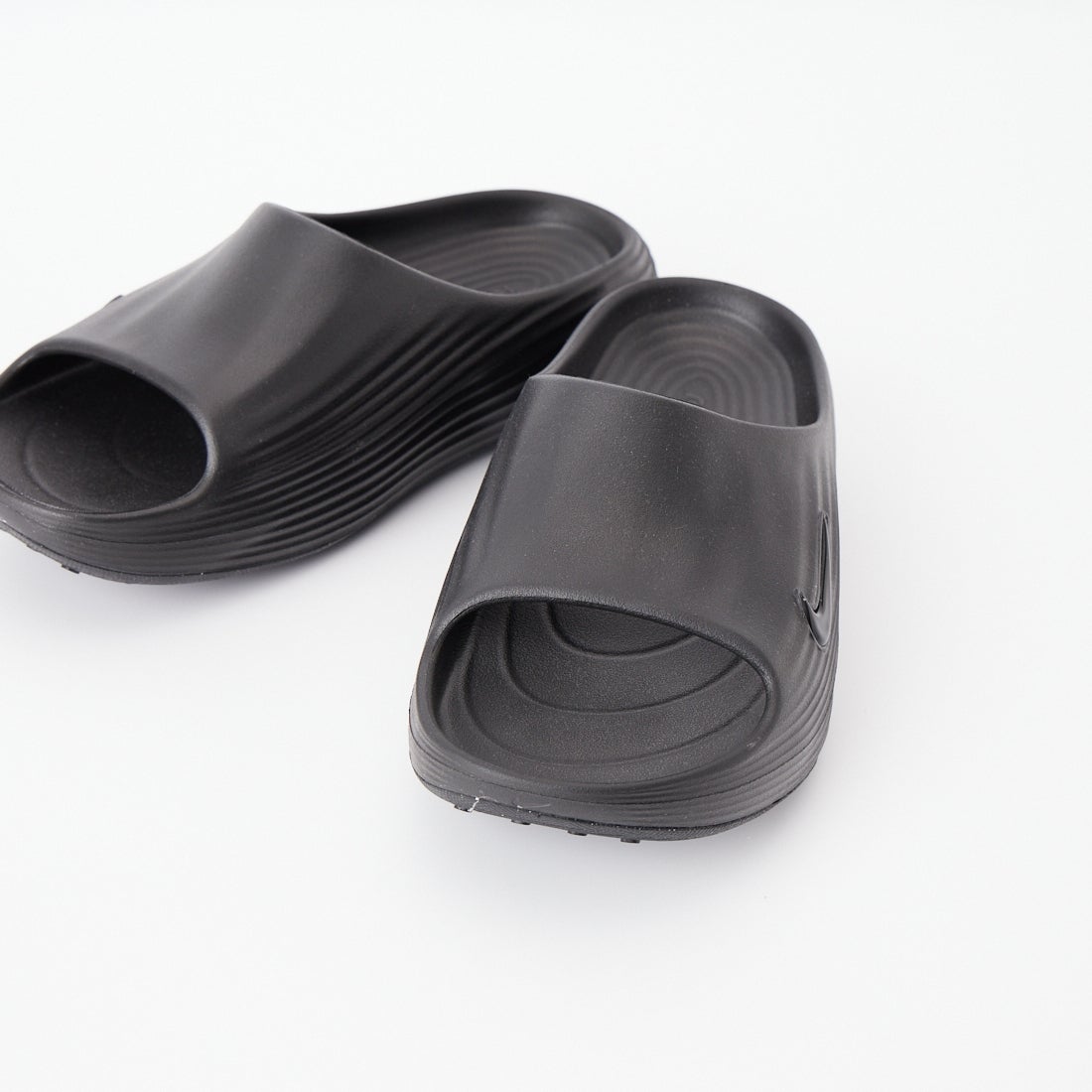 NIKE [ナイキ] ReactX リジュビネイト スライドサンダル [HV4479] 001 ﾌﾞﾗｯｸ