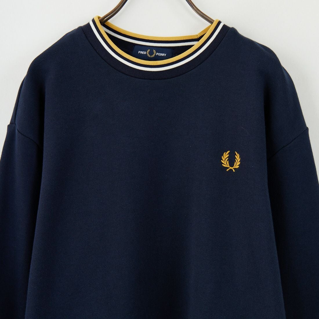 FRED PERRY [フレッドペリー] 別注 ツインティップライン ワンポイントロゴ刺繍クルーネックスウェット [FPM-25A-025JF] NVY/ECR/HO