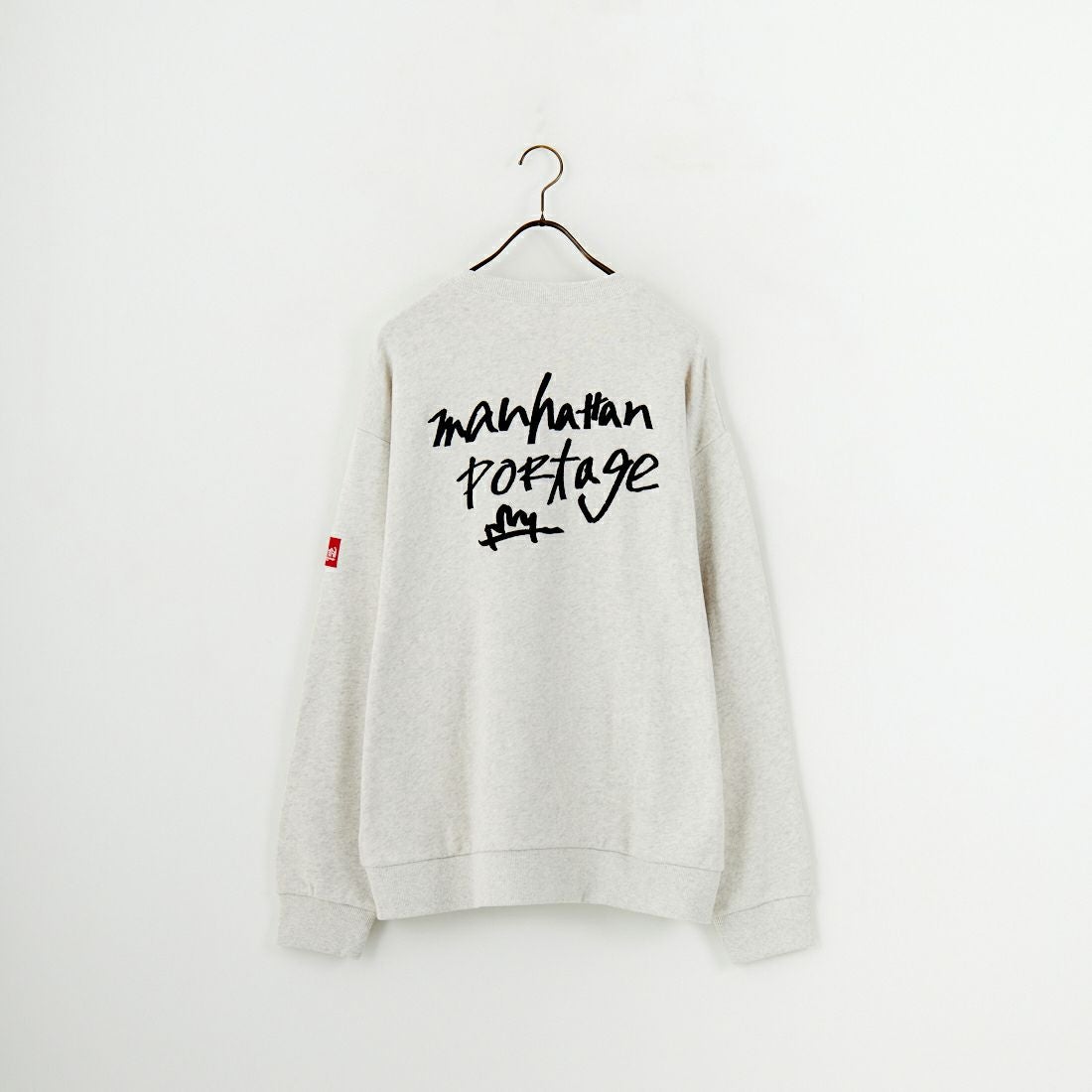 MANHATTAN PORTAGE [マンハッタンポーテージ] 別注 手書き風バック刺繍クルーネックスウェット [25FWMP-IN69-JF] OATMEAL