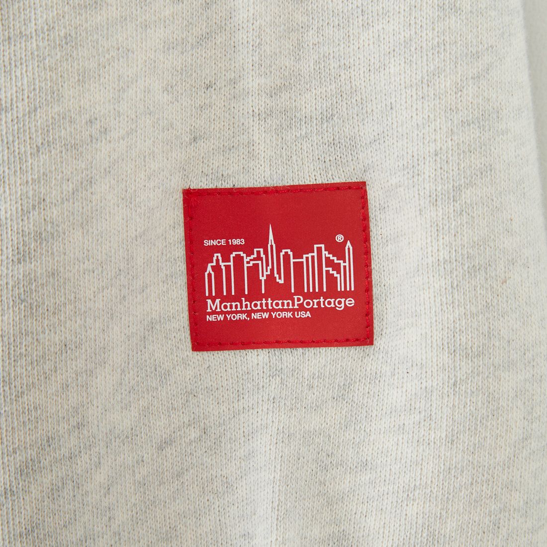 MANHATTAN PORTAGE [マンハッタンポーテージ] 別注 手書き風バック刺繍クルーネックスウェット [25FWMP-IN69-JF] OATMEAL