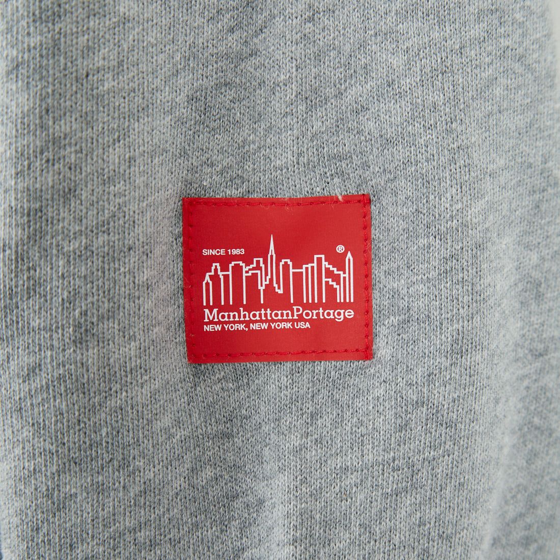 MANHATTAN PORTAGE [マンハッタンポーテージ] 別注 フードロゴ刺繍 スウェットパーカー [25FWMP-IN71-JF] H.GRAY