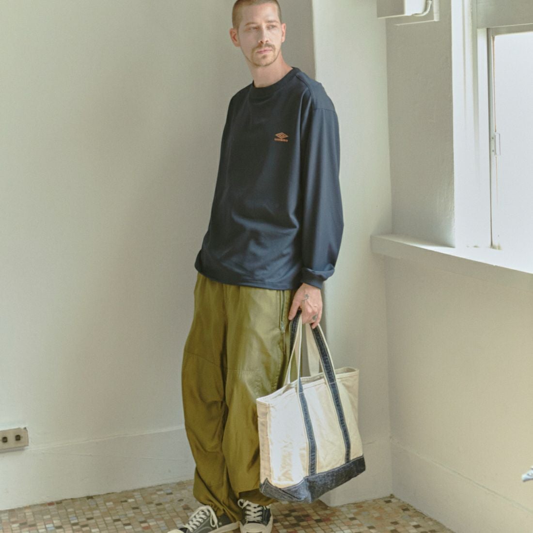 UMBRO [アンブロ] 別注 ワンポイント刺繍ロゴ ドローコードスウェット [KBT126-NK-PO2-MS-JF] NAVY