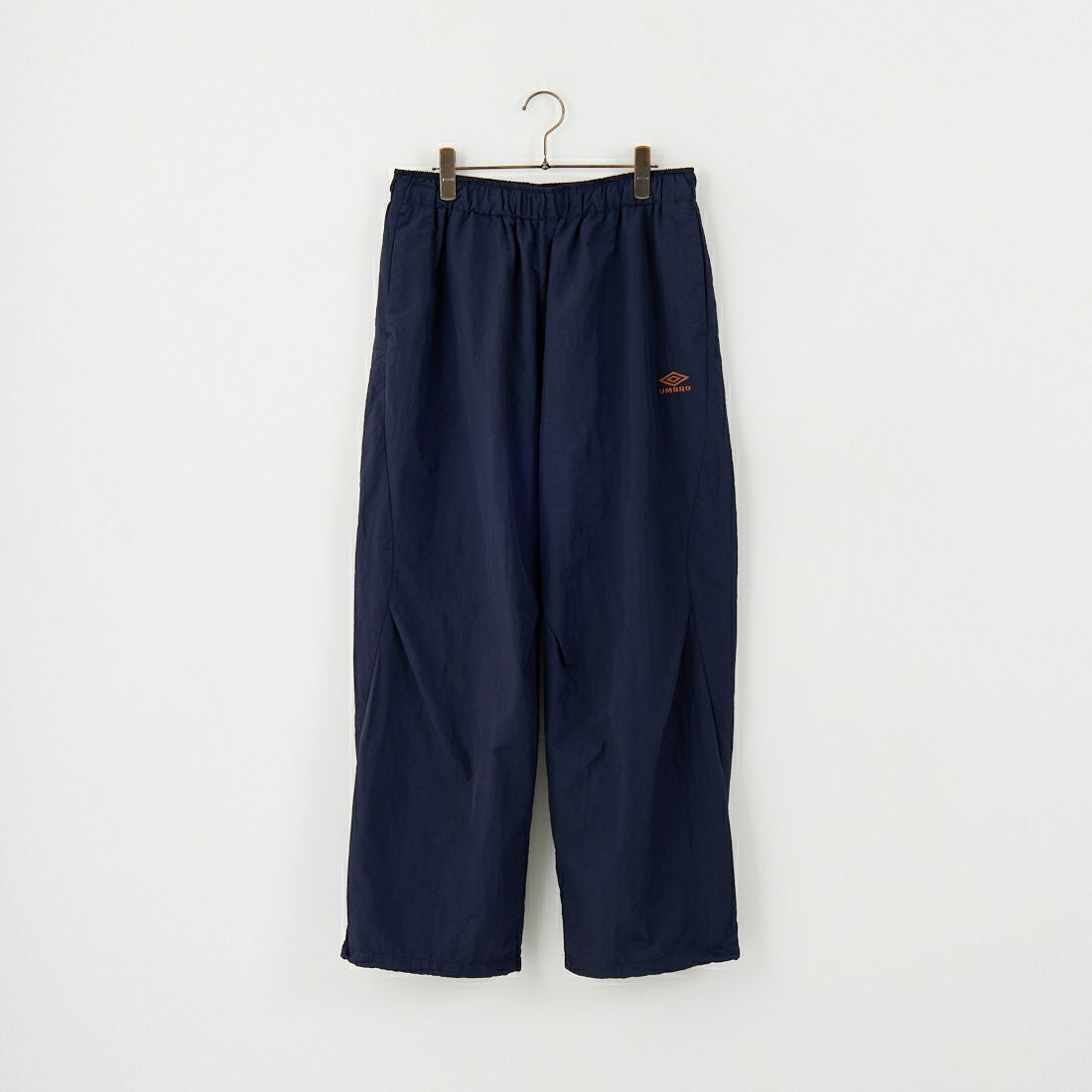 UMBRO [アンブロ] 別注 ナイロントラックパンツ [KBT126-NK-PT1-MS-JF] NAVY