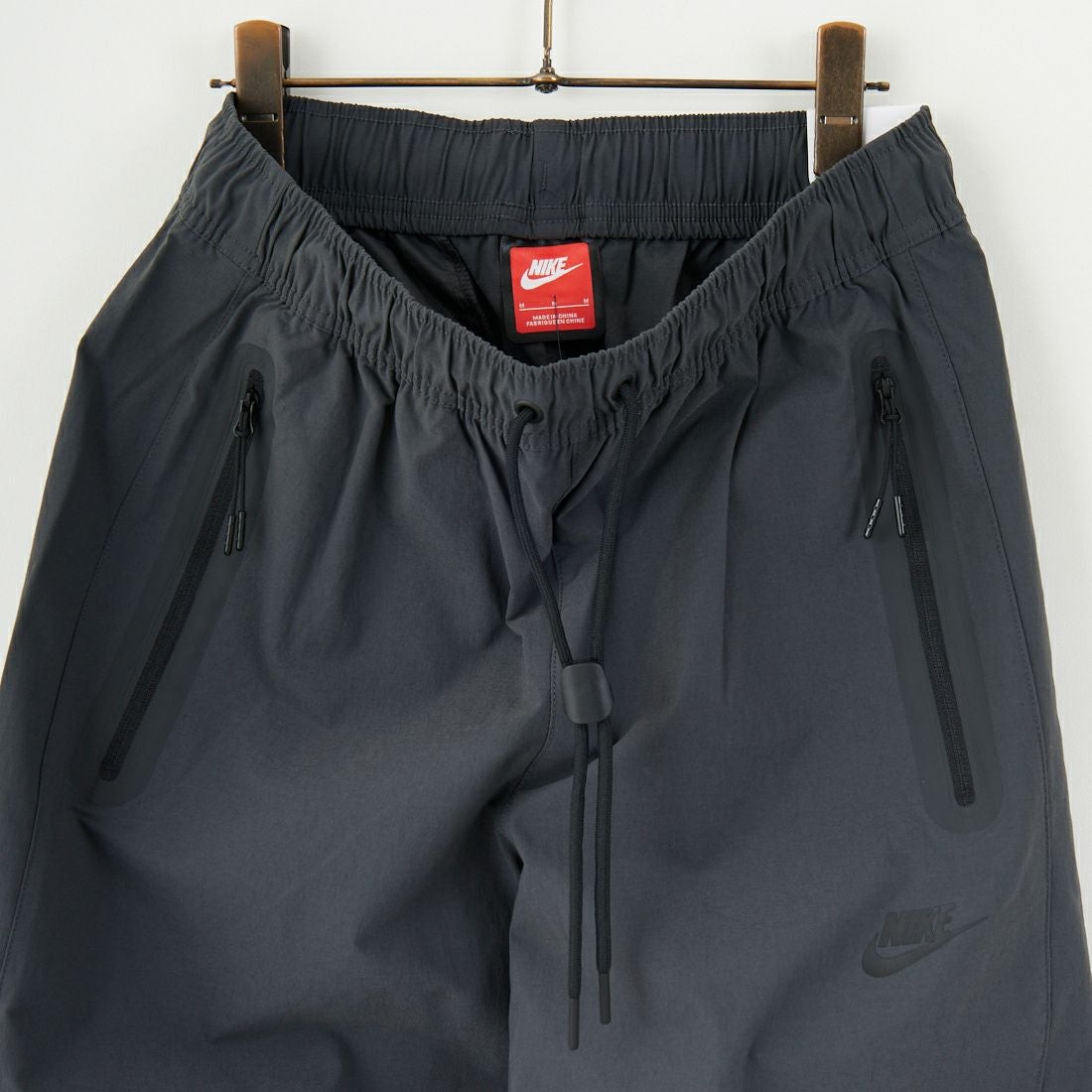 NIKE [ナイキ] テックウーブンパンツ [HM8242] 061 ANTHRA