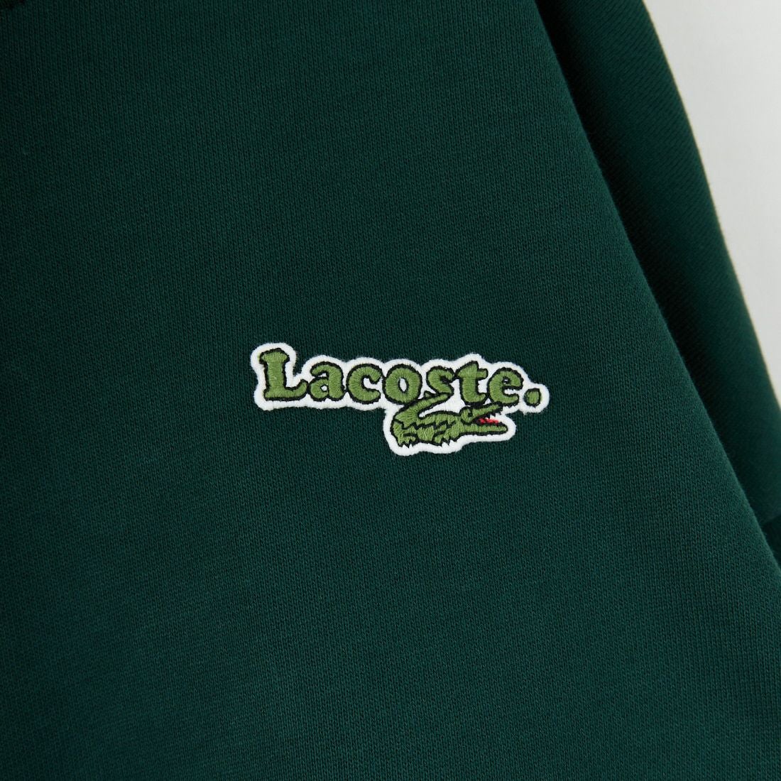 LACOSTE [ラコステ] ロゴパッチスウェットフーディ [SF7607] YZP SINOPL
