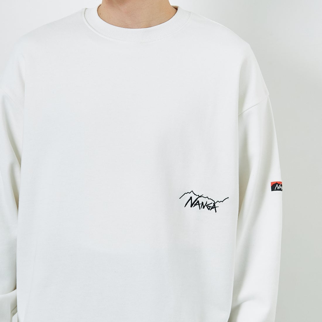 JEANSFACTORY × NANGA [ジーンズファクトリー × ナンガ] 別注 ワンポイント刺繍ロゴ ドローコードスウェット [NW2507-JF] WHITE