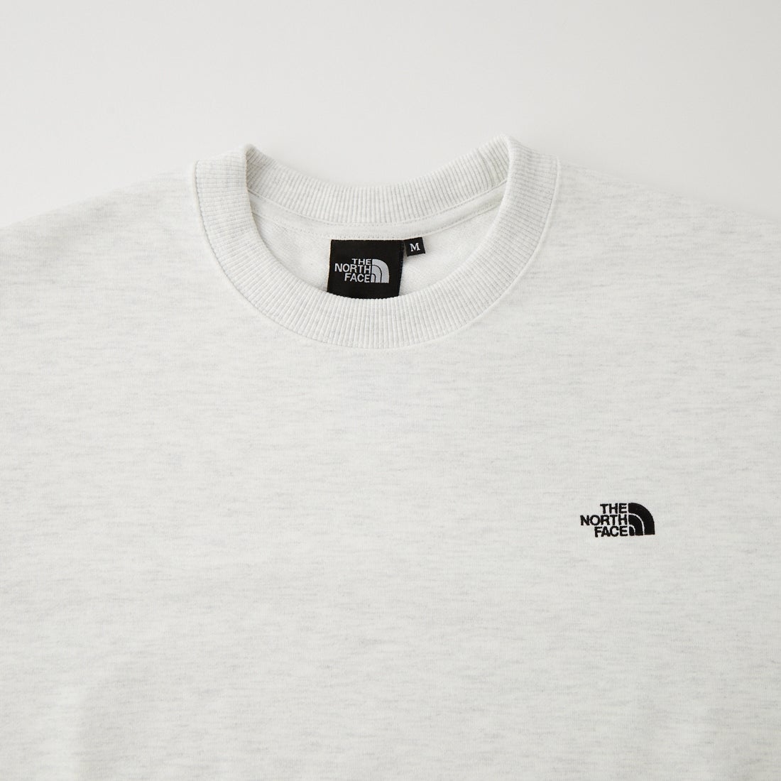THE NORTH FACE [ザ ノースフェイス] スモールロゴヘザースウェットクルー [NT62532] WX