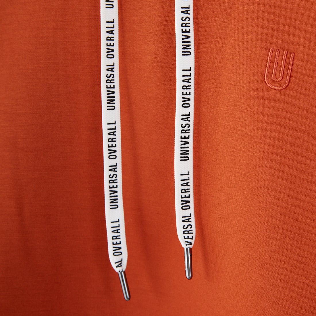 UNIVERSAL OVERALL [ユニバーサルオーバーオール] 別注 ワンポイントロゴ刺繍 ポンチ スウェットパーカー [U2531230IN-JF] ORANGE