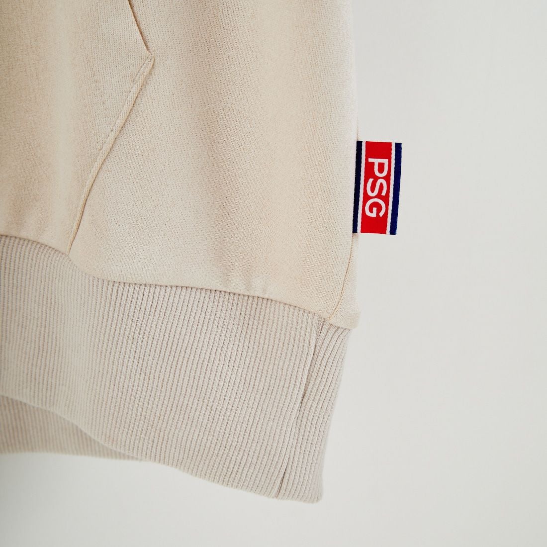 PARIS SAINT-GERMAN [パリ・サンジェルマン] PSG ポリスエードエンボスロゴフーディ [PS0625FW0001] IVORY