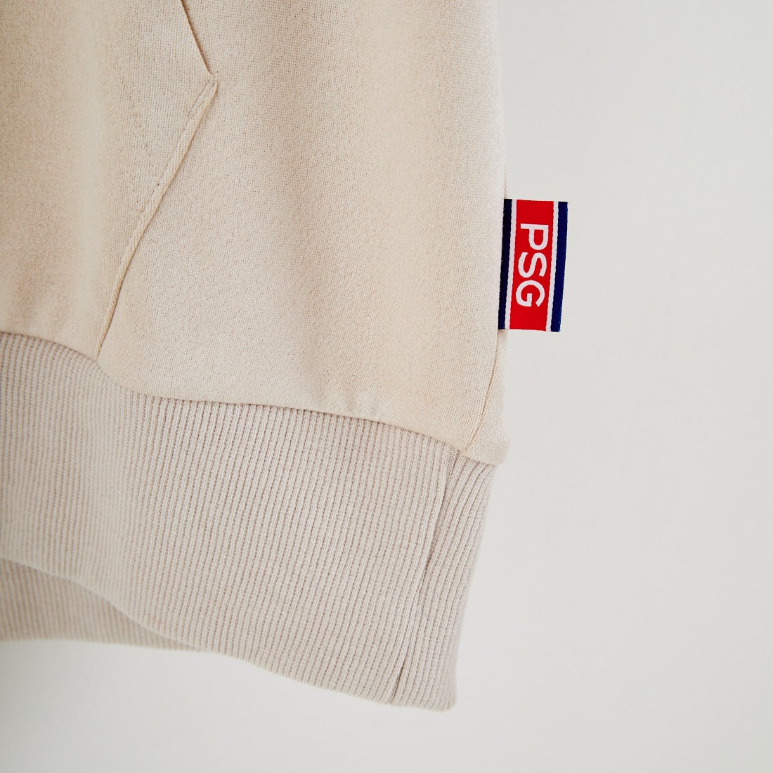 PARIS SAINT-GERMAN [パリ・サンジェルマン] PSG ポリスエードエンボスロゴフーディ [PS0625FW0001] IVORY