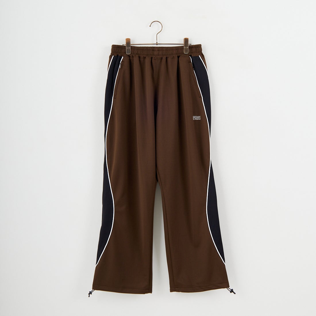 SEDAN ALL-PURPOSE [セダン オールパーパス] OGロゴ トラックパンツ [SD25F-PT05] BRN/BLK