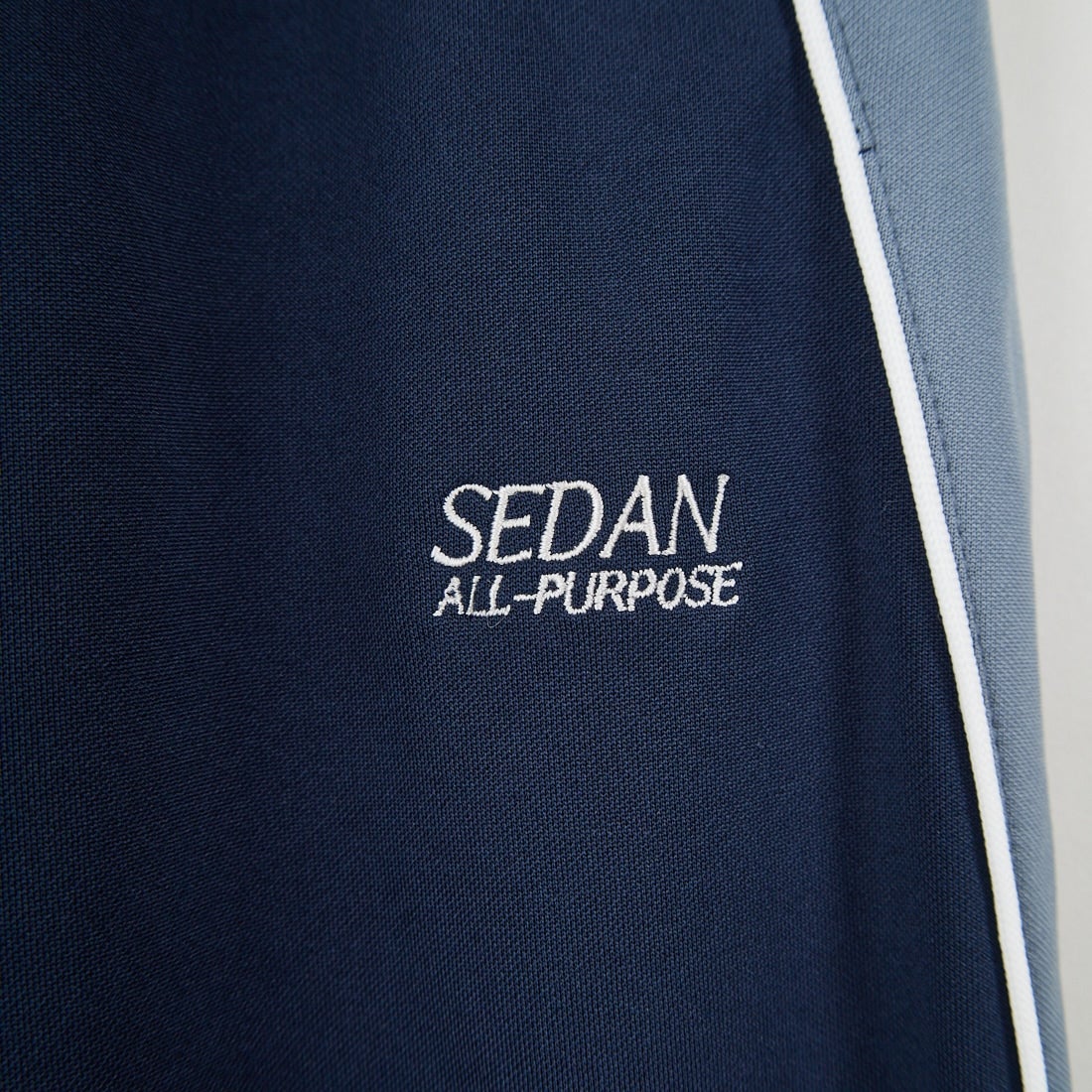 SEDAN ALL-PURPOSE [セダン オールパーパス] OGロゴ トラックパンツ [SD25F-PT05] NVY/GRY