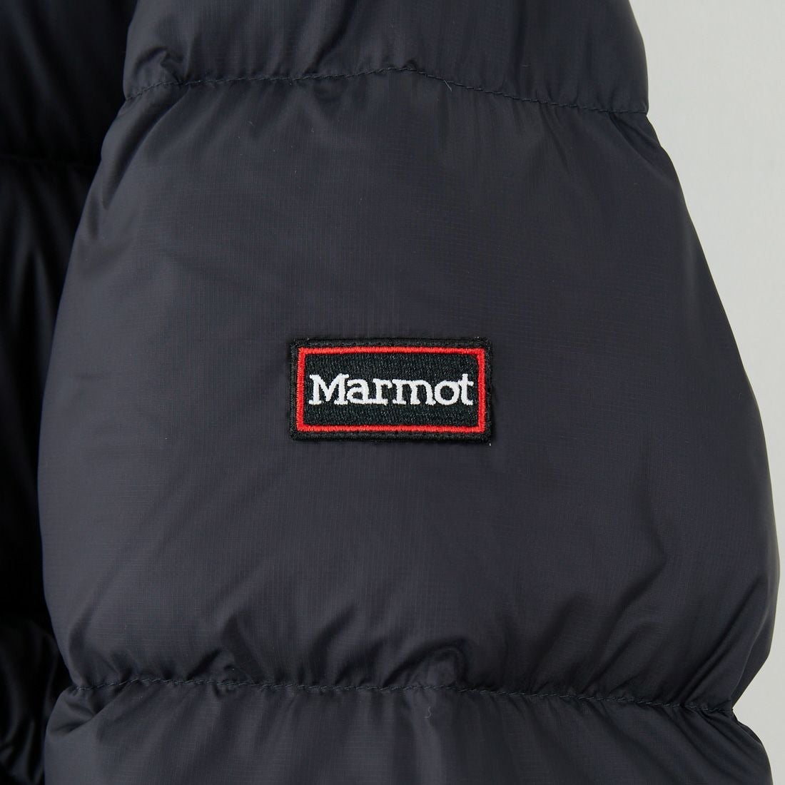Marmot [マーモット] 別注 ワンポイントロゴ ダウンジャケット [MTFW25UDW329IN-JF] BLACK