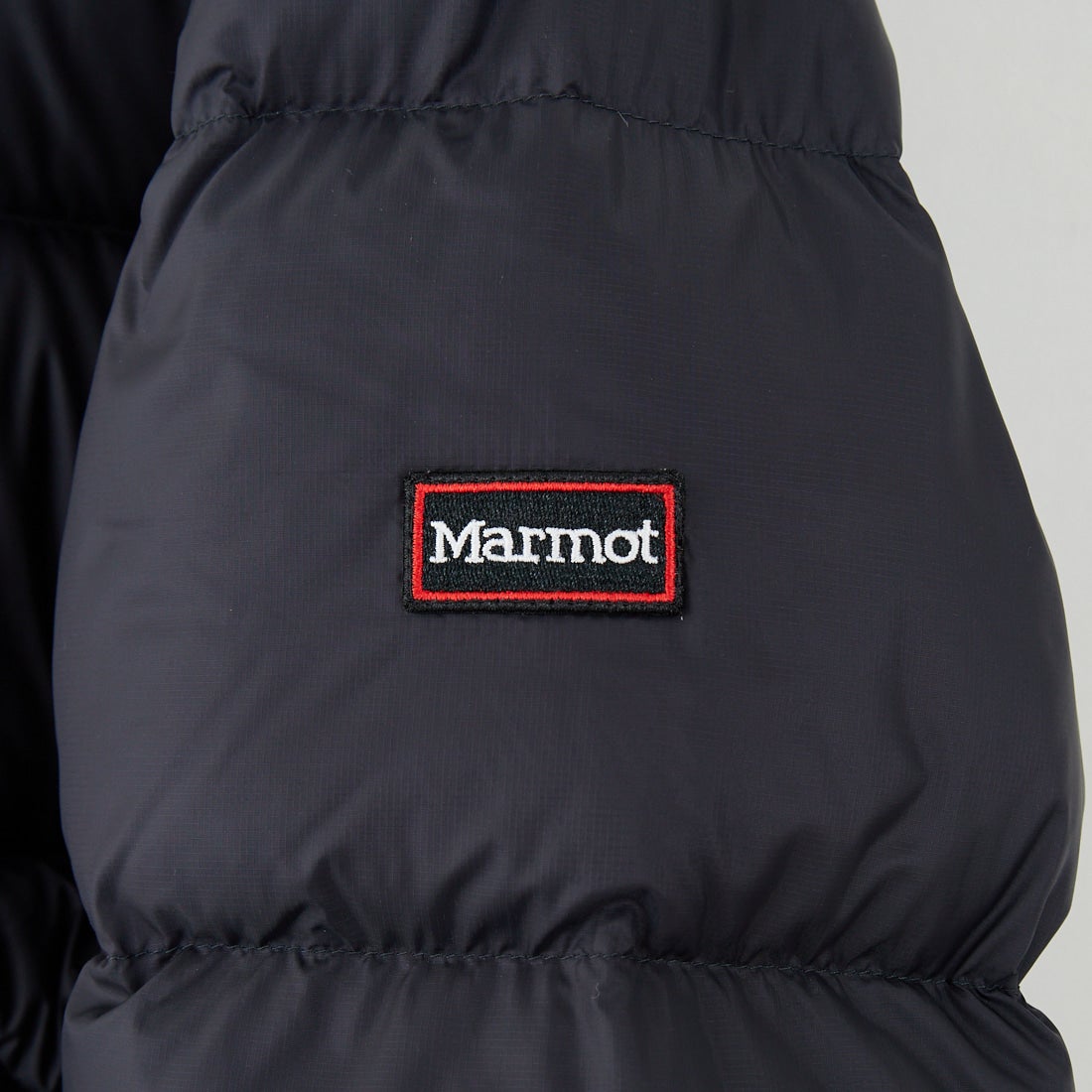Marmot [マーモット] 別注 ワンポイントロゴ ダウンジャケット [MTFW25UDW329IN-JF] BLACK