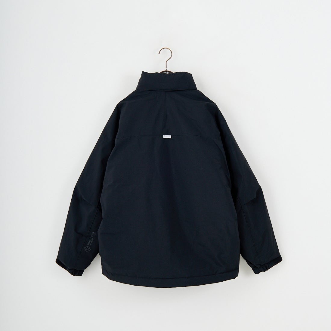 phenix [プラスフェニックス] 別注 LEVEL7 ダウンジャケット [POO