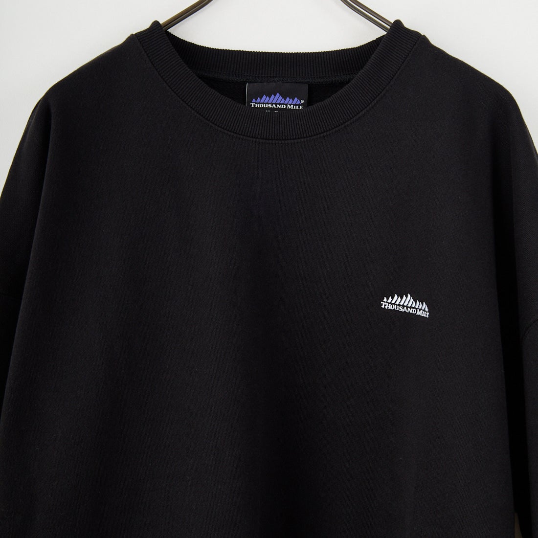 THOUSAND MILE [サウザンド マイル] 別注 バックプリント クルーネックスウェット [TM252UK50520-JF] 09 BLACK