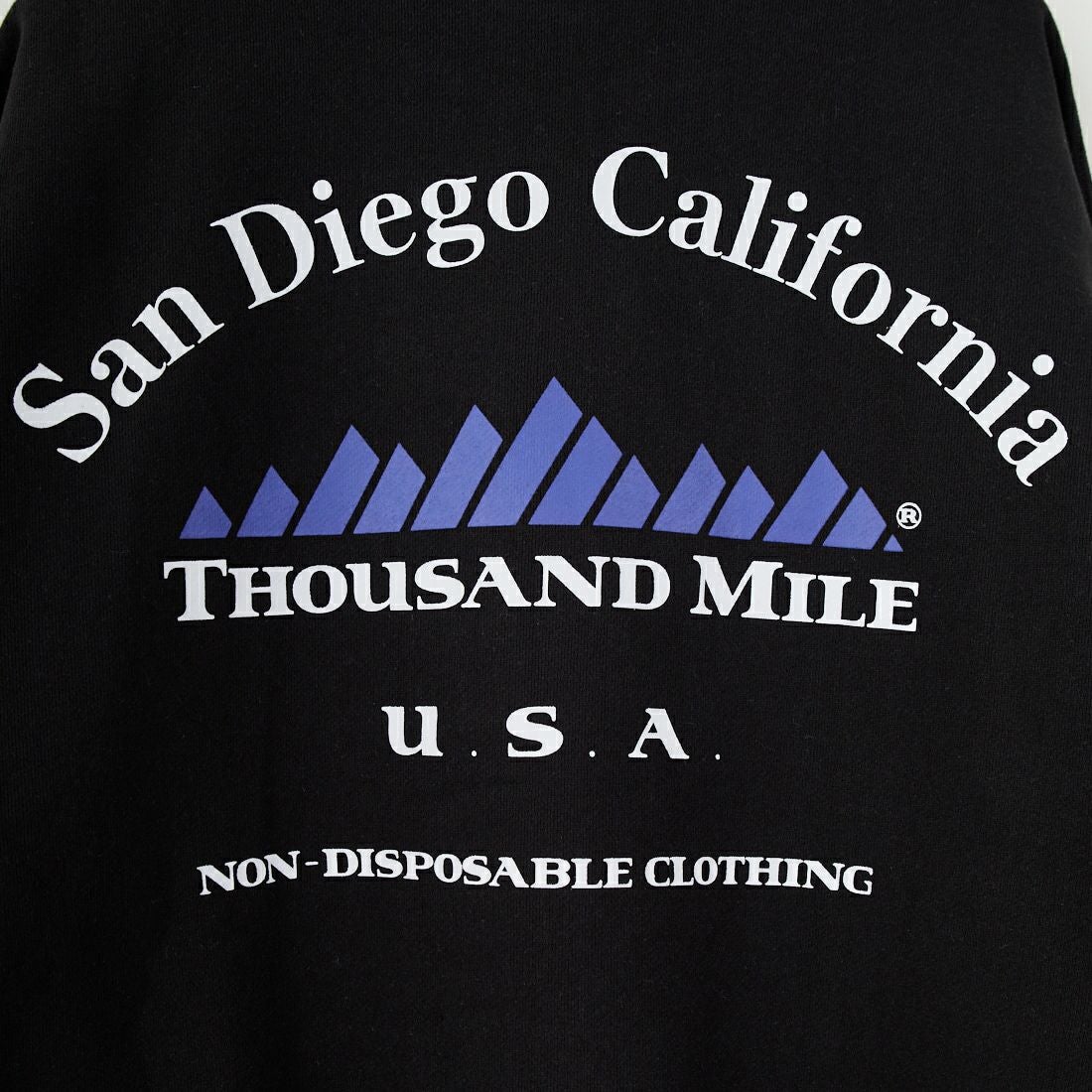 THOUSAND MILE [サウザンド マイル] 別注 バックプリント クルーネックスウェット [TM252UK50520-JF] 09 BLACK