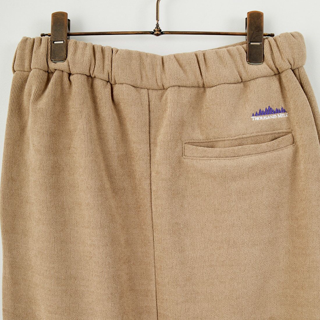 THOUSAND MILE [サウザンド マイル] ニットフリース フロントジップスカート [TM252KF00202] 23 SAND BE
