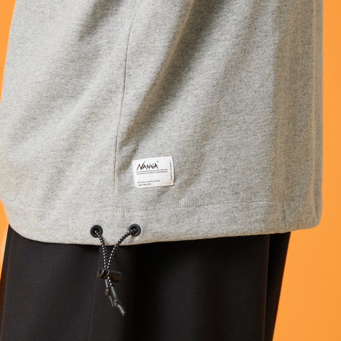 JEANSFACTORY × NANGA [ジーンズファクトリー × ナンガ] 別注 ルーズフィット メッシュ切替え ドローコードTシャツ [NW26SS-JF7] GRAY