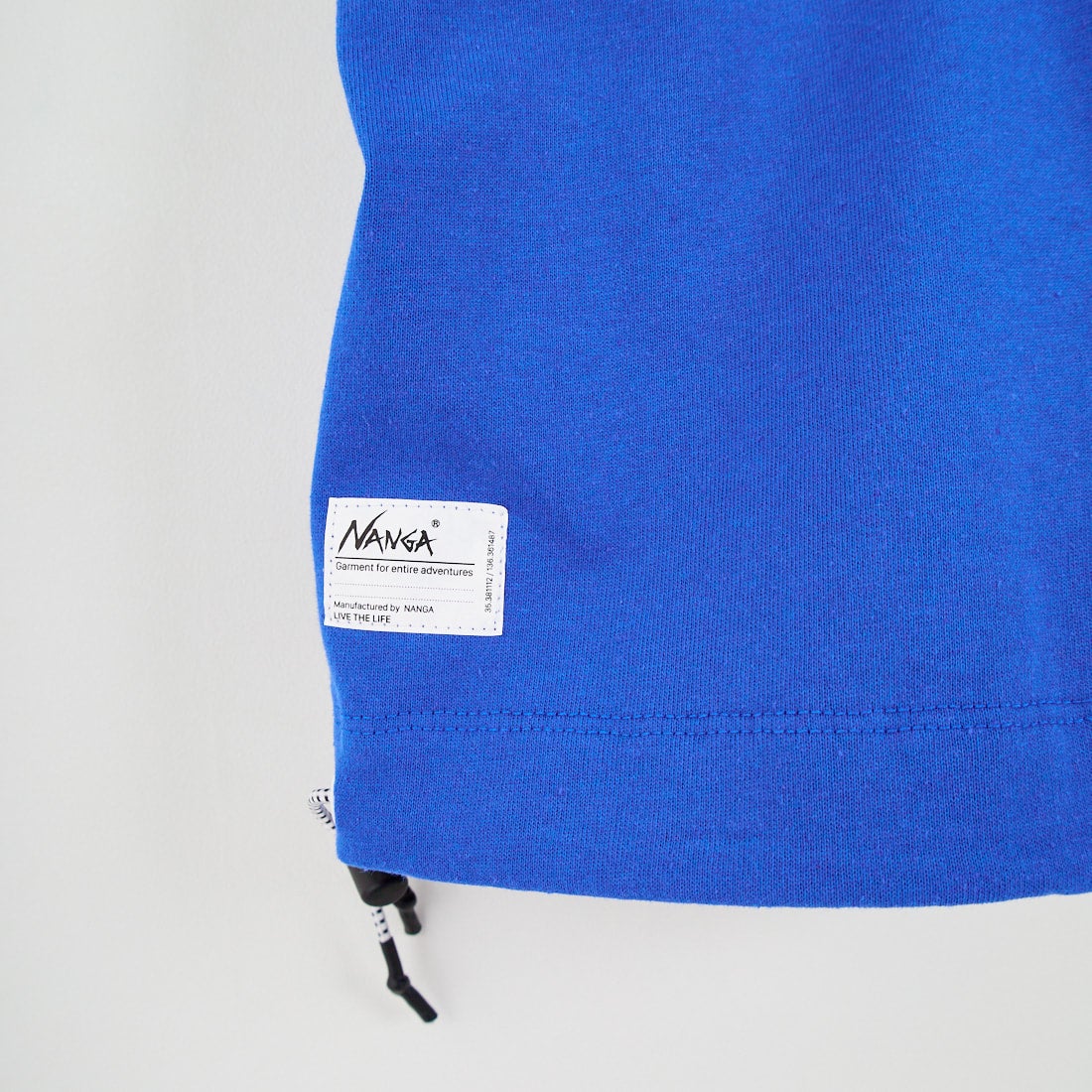 JEANSFACTORY × NANGA [ジーンズファクトリー × ナンガ] 別注 ルーズフィット スクエアロゴバックプリント ドローコードTシャツ [NW26SS-JF6] BLUE