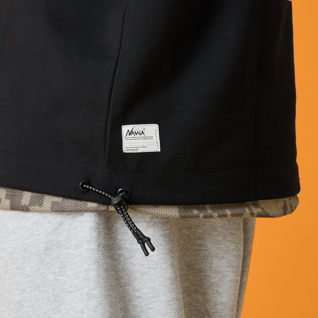 JEANSFACTORY × NANGA [ジーンズファクトリー × ナンガ] 別注 ルーズフィット スクエアロゴバックプリント ドローコードTシャツ [NW26SS-JF6] BLACK